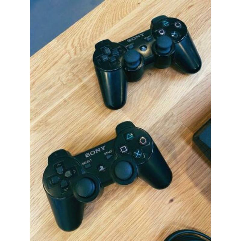 PlayStation 3 + 31 spellen en 3 controllers