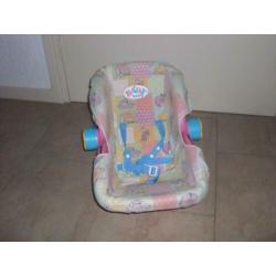 baby born maxicosi kun je een wipstoel van maken + rammeltje