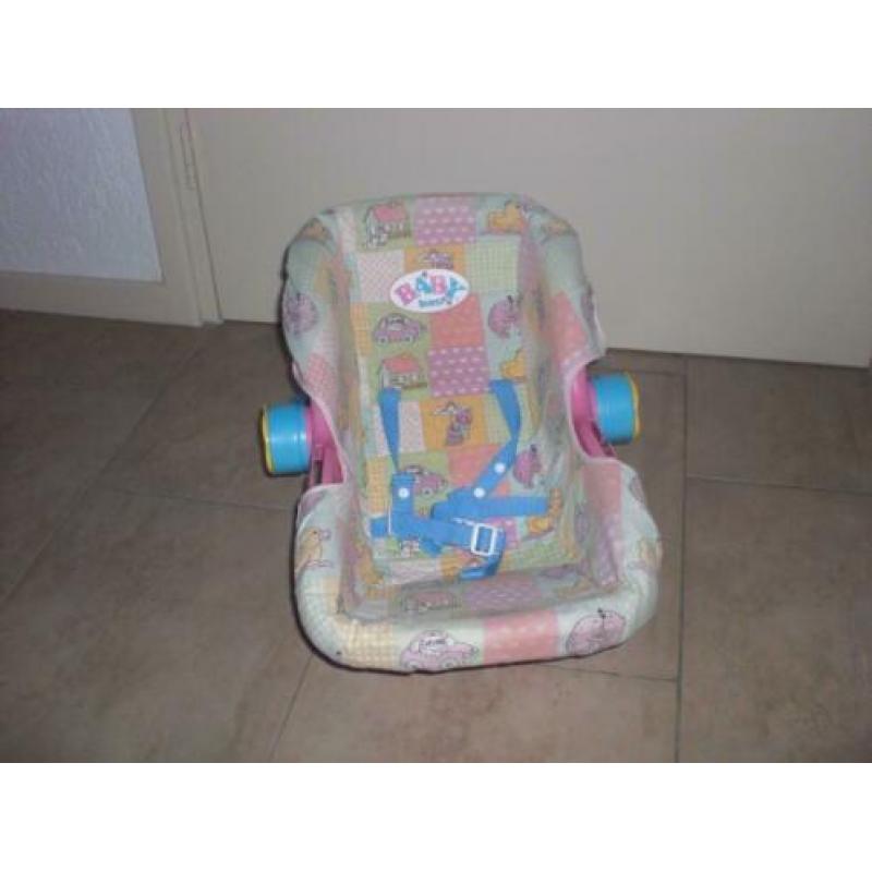 baby born maxicosi kun je een wipstoel van maken + rammeltje