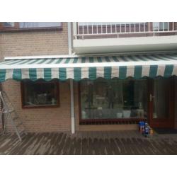 Te koop zonnescherm 5.50 uitval 3.20