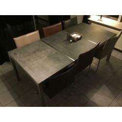Eetkamertafel met stenen blad en rvs onderstel. 210 x 100 cm
