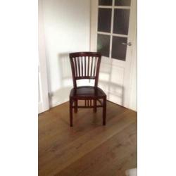 8 teakhouten stoelen