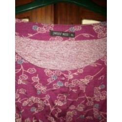 Leuke tuniek in bordeaux rood met print en 3/4 mouwen. 95% V