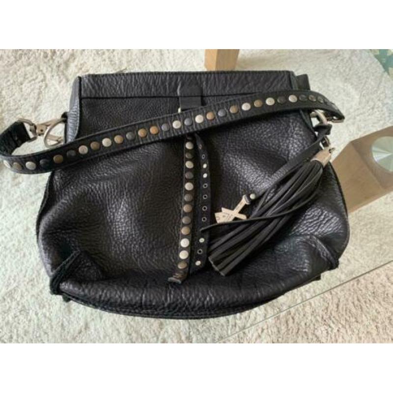 X works tas