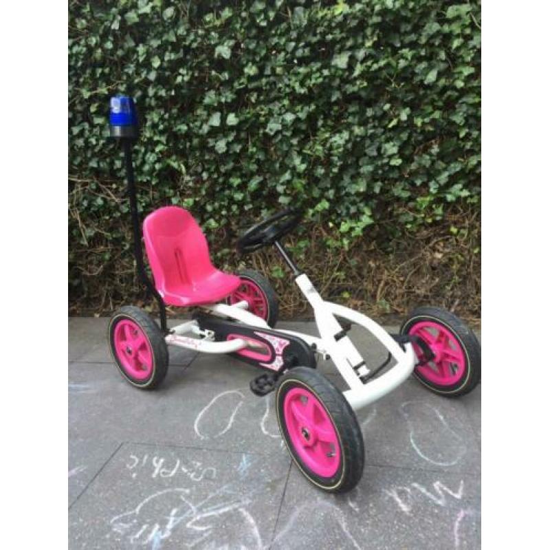 Prachtige Buddy skelter van Berg. Roze/wit mét zwaailicht
