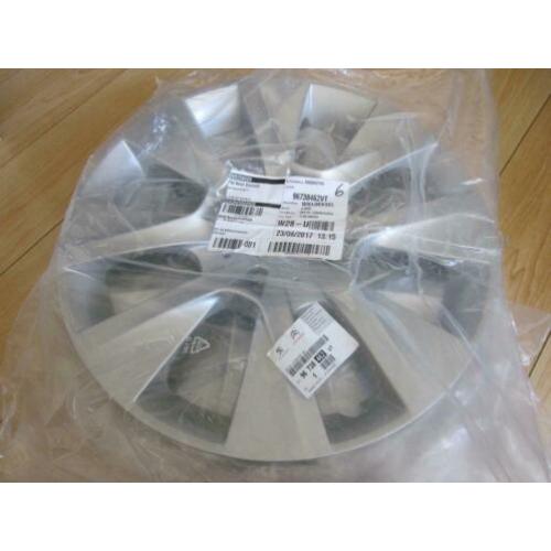 Peugeot 208 originele wieldoppen set 4 stuks 15 inch