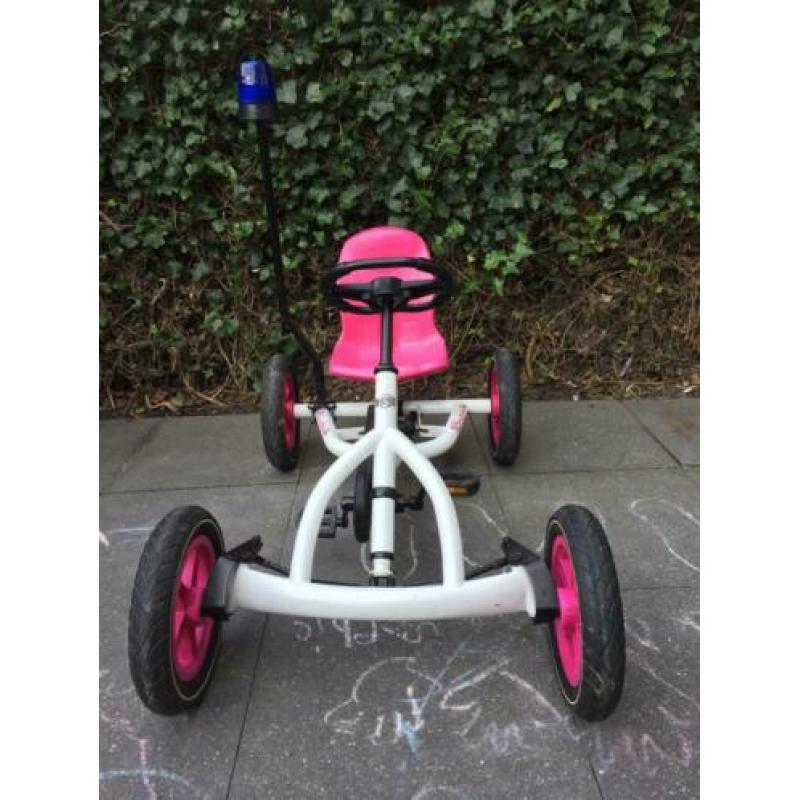 Prachtige Buddy skelter van Berg. Roze/wit mét zwaailicht