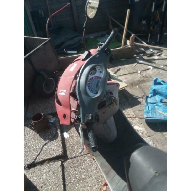 Op knap scooter