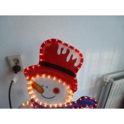 Sneeuwpop met verlichting