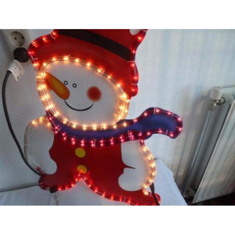 Sneeuwpop met verlichting