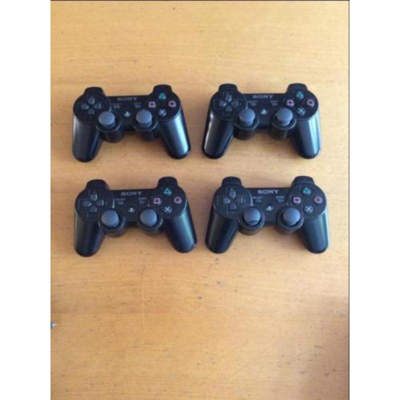 Playstation 3 + 4 controllers + 6 spellen
