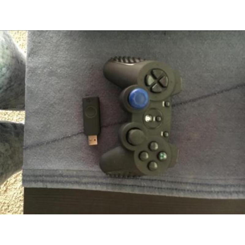 Playstation 3 + controller en 8 spellen